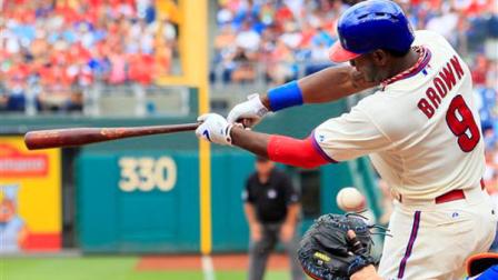 Philadelphia Phillies Domonic Brown strikes out swinging during the second inning of a baseball game with the New York Mets, Sunday, June 23, 2013, in Philadelphia. (AP Photo/Tom Mihalek)