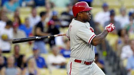 Philadelphia Phillies Delmon Young hits an RBI single in the first inning against the Los Angeles Dodgers during a baseball game Friday, June 28, 2013, in Los Angeles. (AP Photo/Alex Gallardo)