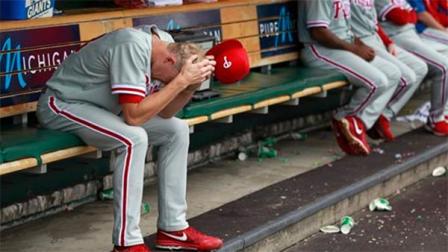 Philadelphia Phillies pitcher Jake Diekman sits in the dugout after being pulled during the sixth inning of a baseball game against the Detroit Tigers in Detroit, Sunday, July 28, 2013. (AP Photo/Carlos Osorio)