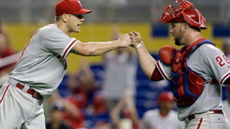 Philadelphia Phillies relief pitcher Jonathan Papelbon, left, bumps fists with catcher Cameron Rupp (29) after the Phillied defeated the Marlins 2-1 during a baseball game,Tuesday, Sept. 24, 2013, in Miami. (AP Photo/Lynne Sladky)