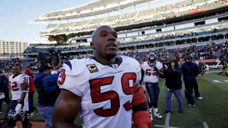 Houston Texans linebacker DeMeco Ryans (59) walks off the field after an NFL football game against the Cincinnati Bengals, Sunday, Dec. 11, 2011, in Cincinnati. (AP Photo/David Kohl)
