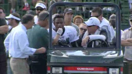 Philadelphia Eagles cornerback Nnamdi Asomugha being carted off after an injury at training camp on August 13, 2012.