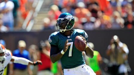 Philadelphia Eagles quarterback Michael Vick (7) looks for a receiver during an NFL football game against the Cleveland Browns Sunday, Sept. 9, 2012, in Cleveland. (AP Photo/Tony Dejak)