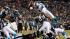 Carolina Panthers quarterback Cam Newton, top,...