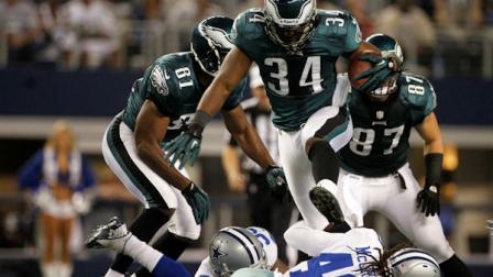 Philadelphia Eagles running back Bryce Brown (34) leaps over Dallas Cowboys strong safety Danny McCray (40) during the first half of an NFL football game Sunday, Dec. 2, 2012 in Arlington, Texas. (AP Photo/Tony Gutierrez)