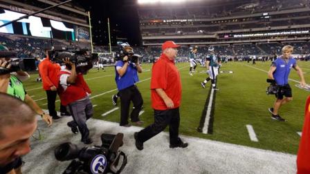 Former Philadelphia Eagles coach Andy Reid, now the Kansas City Chiefs coach, walks the sidelines before the Chiefs NFL football game against the Philadelphia Eagles, Thursday, Sept. 19, 2013, in Philadelphia. (AP Photo/Matt Rourke)