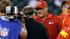 Kansas City Chiefs coach Andy Reid, right, meets...