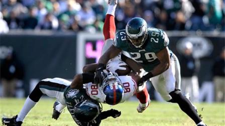 New York Giants wide receiver Victor Cruz (80) is tackled by Philadelphia Eagles Bradley Fletcher (24) and Nate Allen (29) during the second half of an NFL football game on Sunday, Oct. 27, 2013, in Philadelphia. (AP Photo/Michael Perez)