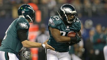 Philadelphia Eagles running back LeSean McCoy (25) takes the hand off from quarterback Nick Foles (9) during the first half of an NFL football game against the Dallas Cowboys Sunday, Dec. 29, 2013, in Arlington, Texas.