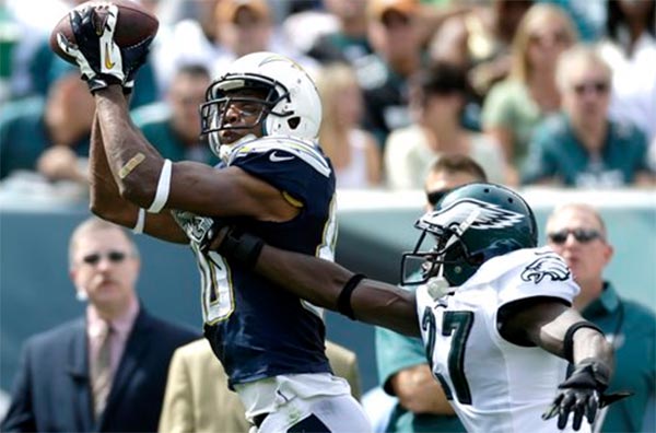 San Diego Chargers Eddie Royal, left, is...