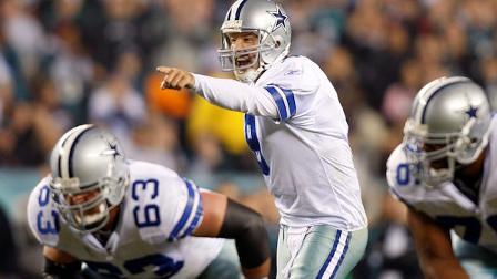 Dallas Cowboys quarterback Tony Romo points to the Philadelphia Eagles defense in the first half of an NFL football game Sunday, Nov. 8, 2009, in Philadelphia. (AP Photo/Mel Evans)