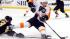 Boston Bruins Zdeno Chara, left, trips...