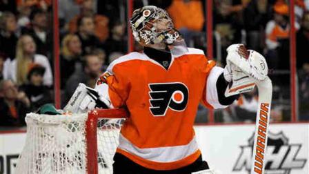 Philadelphia Flyers goalie Sergei Bobrovsky (35) from Russia, watches the replay after allowing a third goal in the first period of an NHL hockey game against the Ottawa Senators, Saturday, March 31, 2012 in Philadelphia. (AP Photo/Alex Brandon)