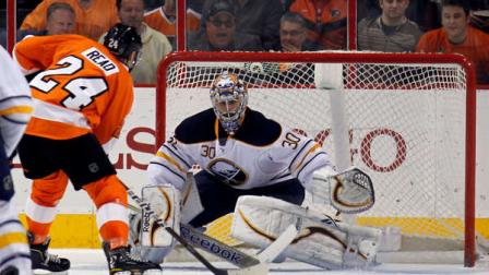 Philadelphia Flyers right wing Matt Read (24) prepares to shoot the winning goal against Buffalo Sabres goalie Ryan Miller (30) in the third period of an NHL hockey game on Thursday, April 5, 2012, in Philadelphia. The Flyers won 2-1. (AP Photo/Alex Brandon)