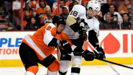 Philadelphia Flyers defenseman Nicklas Grossman, left, defends against Pittsburgh Penguins James Neal during the first period of an NHL hockey game Saturday, Feb. 18, 2012, in Philadelphia. The Flyers acquired Grossman in a trade with the Dallas Stars on Thursday for two draft picks.(AP Photo/Tom Mihalek)