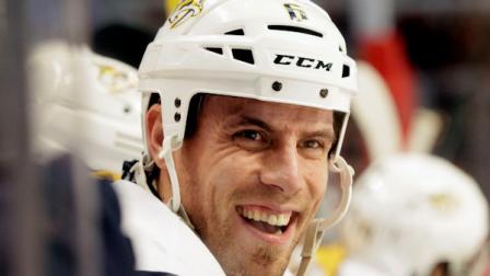 FILE - In tis March 25, 2012, file photo, Nashville Predators Shea Weber smiles as he watches teammates play during the third period of an NHL hockey game against the Chicago Blackhawks in Chicago. (AP Photo/Nam Y. Huh, File)