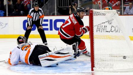 New Jersey Devils left wing Ilya Kovalchuk (17), of Russia, scores on a penalty shot against Philadelphia Flyers goalie Ilya Bryzgalov, of Russia, during the second period of an NHL hockey game, Tuesday, Jan. 22, 2013, in Newark, N.J. (AP Photo/Julio Cortez)