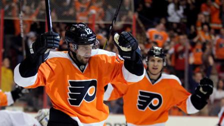 Philadelphia Flyers Simone Gagne (12) celebrates his goal in the second period of an NHL hockey game againt the Washington Capitals, Wednesday, Feb 27, 2013, in Philadelphia. Gagne returned to the Flyers on Tuesday after playing with the L.A. Kings. (AP Photo/Tom Mihalek)