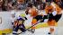 New York Islanders Casey Cizikas, left, vies for...
