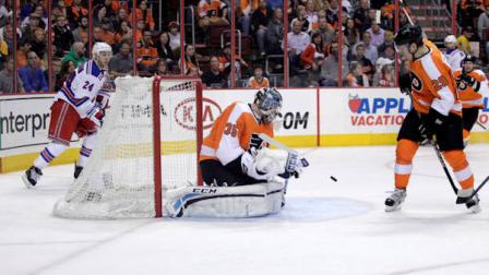 Philadelphia Flyers goalie Steve Mason (35) makes a save against the New York Rangers in the first period of an NHL hockey game, Tuesday, April 16, 2013 in Philadelphia. (AP Photo/ H. Rumph Jr)