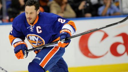 New York Islanders defenseman Mark Streit (2) skates towards a puck during practice before the NHL hockey game against the Pittsburgh Penguins on Friday, March 22, 2013 at Nassau Coliseum in Uniondale, N.Y. (AP Photo/Kathy Kmonicek)