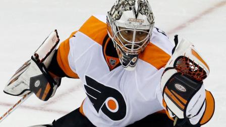 Philadelphia Flyers goalie Ray Emery (29) makes a glove-save in the third period of an NHL hockey game against the Pittsburgh Penguins in Pittsburgh, Wednesday, Nov. 13, 2013. The Flyers won 2-1. (AP Photo/Gene J. Puskar)