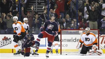 Columbus Blue Jackets Ryan Johansen (19) celebrates a goal against Philadelphia Flyers goalie Ray Emery (29) during the first period of an NHL hockey game on Saturday, Dec. 21, 2013, in Columbus, Ohio. (AP Photo/Mike Munden)