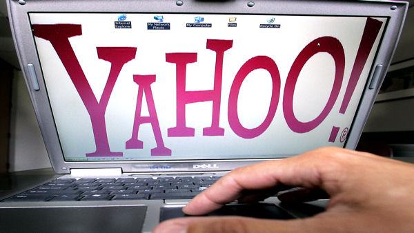 ** FILE ** A large Yahoo! logo is shown on a laptop computer screen in a Portland, Ore. file photo from July 17, 2006. Yahoo Inc. releases third-quarter earnings after the bell. (AP Photo/Don Ryan, File)