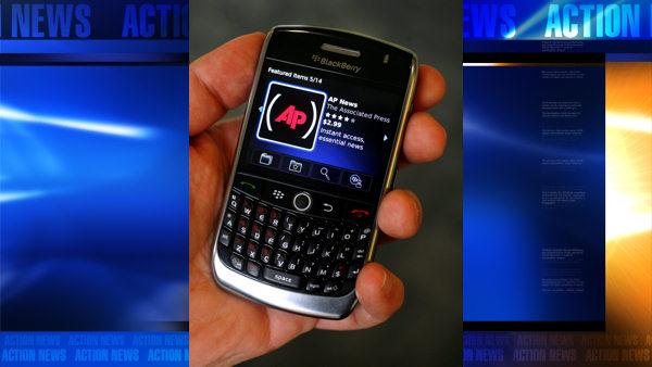 The BlackBerry App World application is shown in use on a Blackberry Curve 8900, Wednesday, April 15, 2009, in New York. (AP Photo/Peter Morgan)