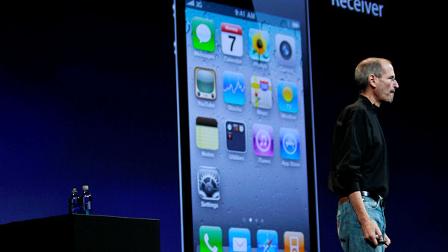 Apple CEO Steve Jobs introduces the new iPhone 4 at the Apple Worldwide Developers Conference, Monday, June 7, 2010, in San Francisco.