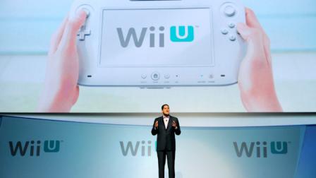 Reggie Fils-Aime, President of Nintendo of America, introduces their new gaming console the Wii U during a news conference at the E3 Gaming Convention in Los Angeles, Tuesday, June 7, 2011. (AP Photo/Chris Pizzello)