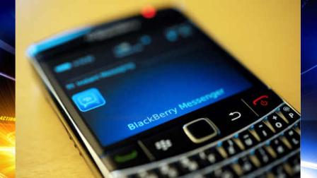 FILE - This file photo taken Sept. 8, 2011, shows a BlackBerry smartphone using the Messenger service, in Berlin. (AP Photo/dapd, Oliver Lang, File)