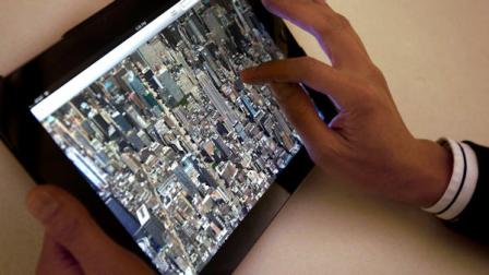 The new Apple Maps application is demonstrated in New York on Thursday, Sept. 20, 2012. Apple released an update to its iPhone and iPad operating system on Wednesday that replaces Google Maps with Apples own application. Early upgraders are reporting that the new maps are less detailed, look weird and misplace landmarks. Its shaping up to be a rare setback for Apple. (AP Photo/Karly Domb Sadof)