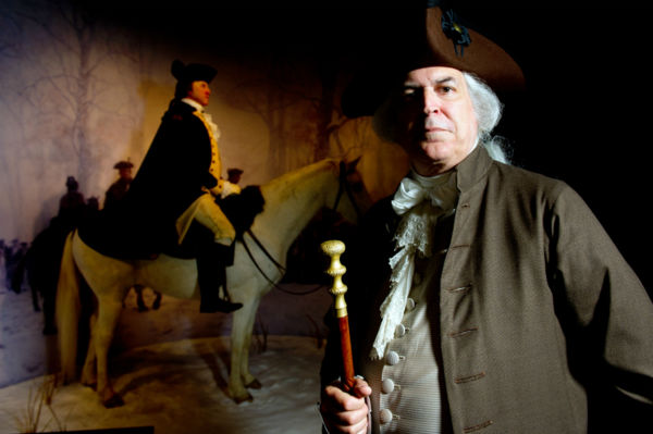 George Washington climbs the steps of the...