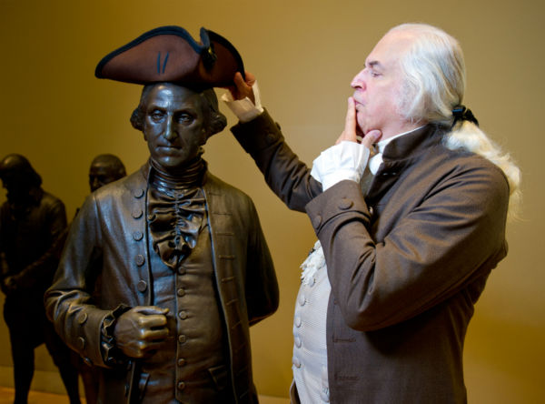 George Washington has some fun with the bronze...
