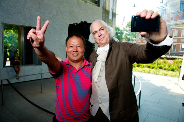 George Washington poses for photos at the...