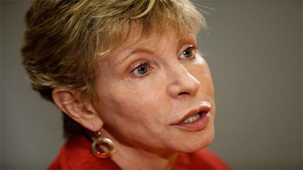 Karen Ignagni, president of Americas Health Insurance Plans, an association representing member companies that provide medical insurance coverage, discusses the political fight over health care reform urged by President Obama as she fends off criticism aimed at the big insurers she represents, Monday, Aug. 10, 2009, during an interview with The Associated Press in Washington. (AP Photo/J. Scott Applewhite)