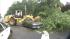 On County Road 571, a large tree flattened a...