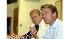 Former U.S. Sen. John Edwards, right, and Iowa...