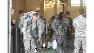 Members of Fort Braggs 4th Psychological Operations Groups 3rd and 9th Battalions load up to leave from Pope AFB for the trip to Haiti (Fred Heggs photo)