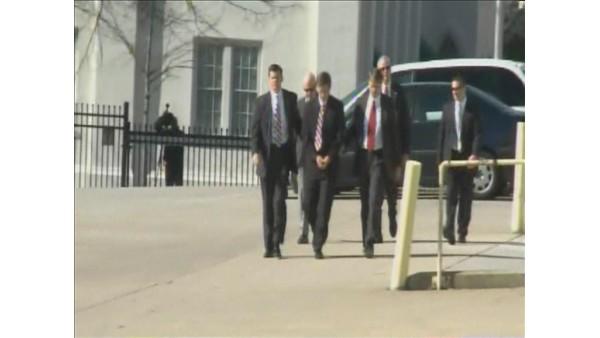 Ruffin Poole, former aide to Governor Mike Easley, arrived at the courthouse in handcuffs