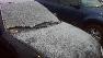 Light snow dusts a car in Durham Thursday morning