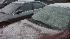 A light dusting of snow coats cars in Durham...