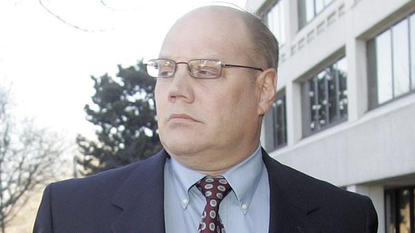Master Sgt. Timothy Hennis leaves the Terry Sanford Federal Building and Courthouse after a federal hearing in Raleigh, N.C. on Friday, Feb. 26, 2010. (AP Photo/Jim R. Bounds)