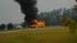 A bus burns Wednesday morning in Edgecombe...
