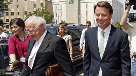 Former presidential candidate John Edwards, right, leaves the federal courthouse with attorney Wade Smith, left, in Greensboro, N.C., Tuesday, June 21, 2011.