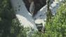 The plane went down in a heavily wooded area.