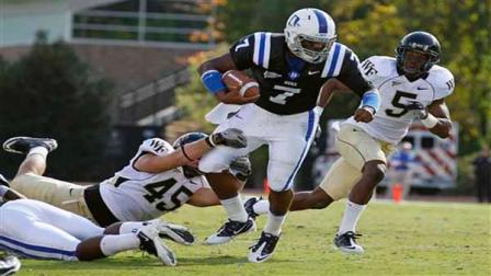 Wake Forests Riley Haynes (45) and Cyhl Quarles (5) try to catch Dukes Anthony Boone (7) during the second half of an NCAA college football game Saturday, Oct. 22, 2011, in Durham, N.C. Wake Forest won 24-23.