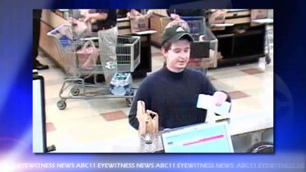 A surveillance photo of an alleged bank robber taken at the SunTrust branch inside a Kroger supermarket 940 US Highway 64 on November 7.