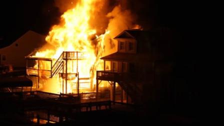 A huge fire in Holden Beach destroyed two homes and left others damaged early Tuesday morning.